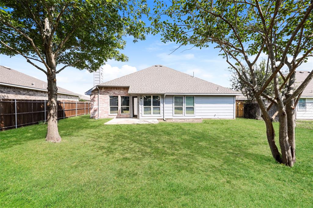 328 Willow Creek Drive Glenn Heights, TX 75154 - Photo 15 of 16 a front view of a house with a yard