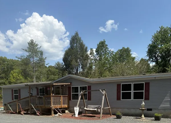 a view of a house that has a patio