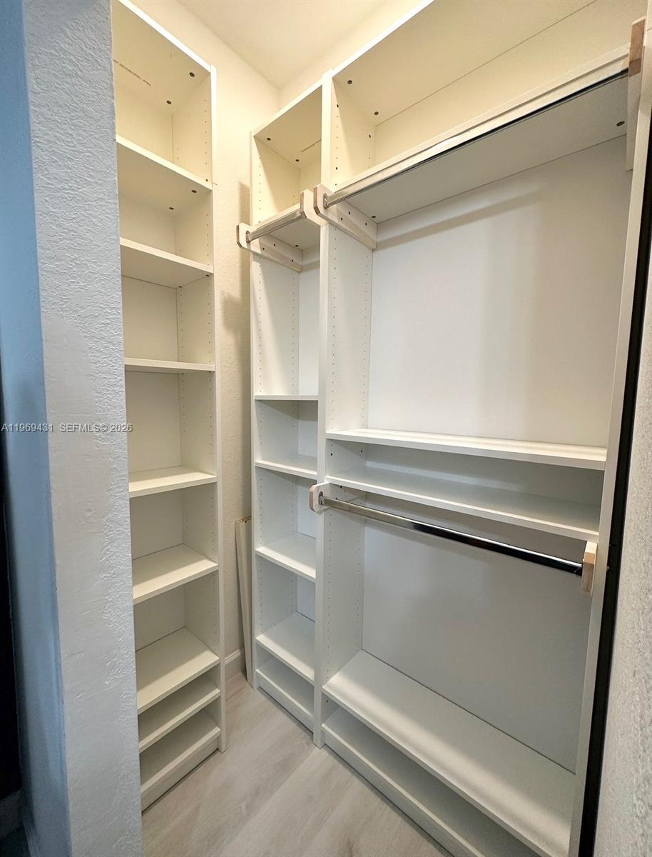 14724 Southwest 181st Terrace Miami, FL 33187 - Photo 29 of 36 a refrigerator in a kitchen