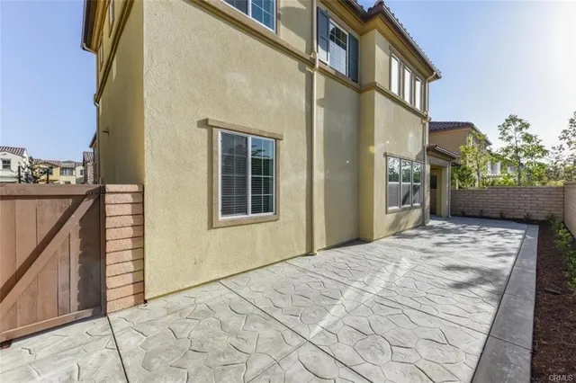 a view of a front of house with a street
