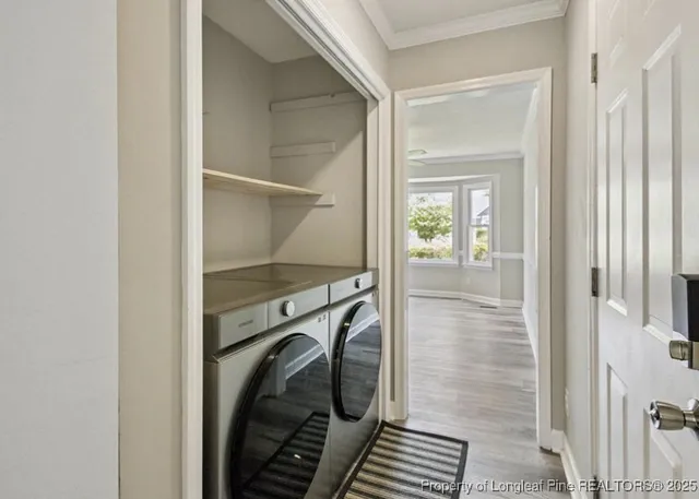 a utility room with a washer and dryer