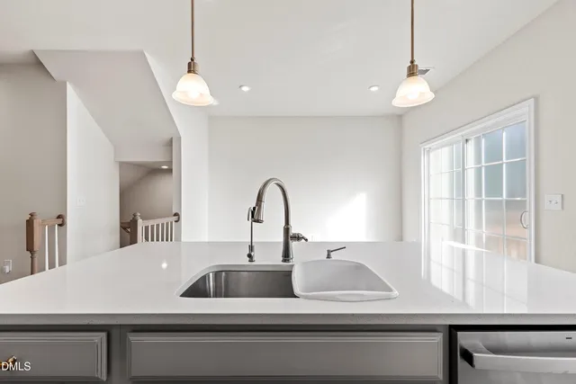 a kitchen with a stove and cabinets