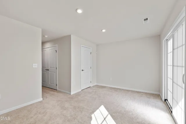 a room with a closet and couch