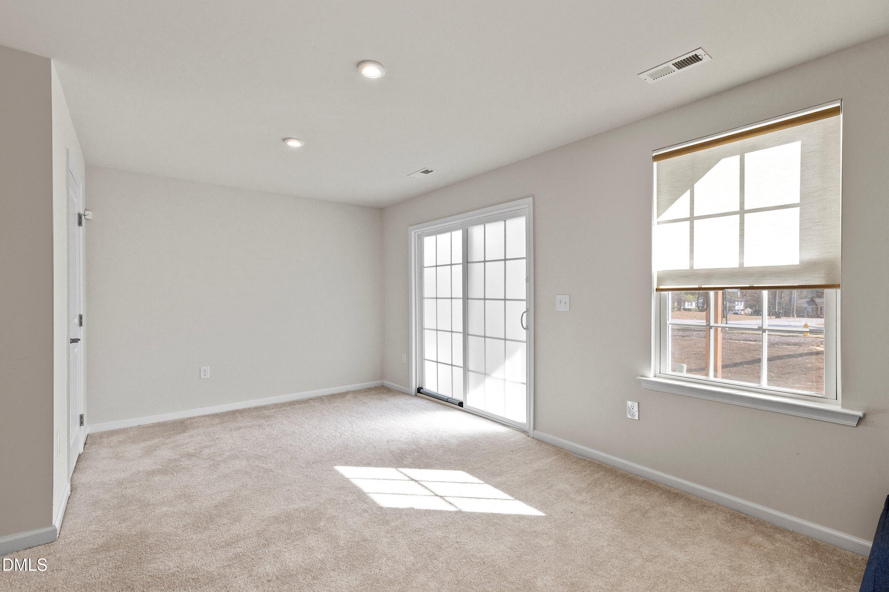 6430 Pathfinder Way Raleigh, NC 27616 - Photo 20 of 39 an empty room with a window