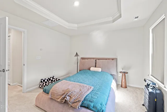 a bedroom with a bed and furniture