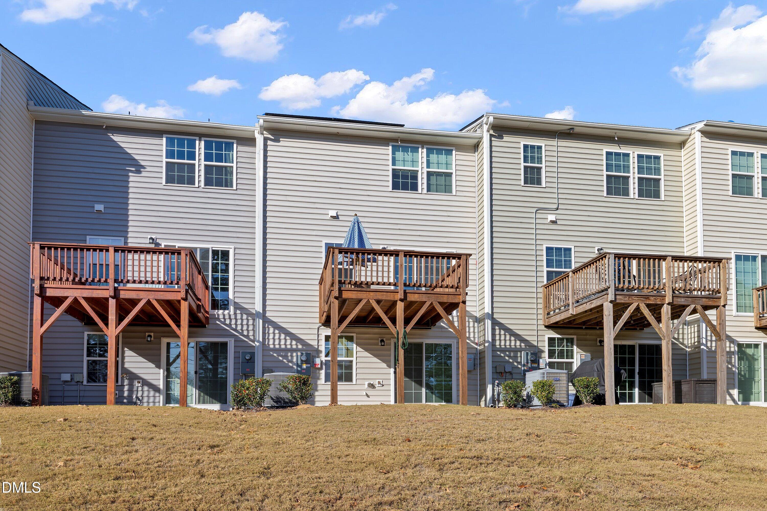 6430 Pathfinder Way Raleigh, NC 27616 - Photo 35 of 39 a view of a house with wooden deck
