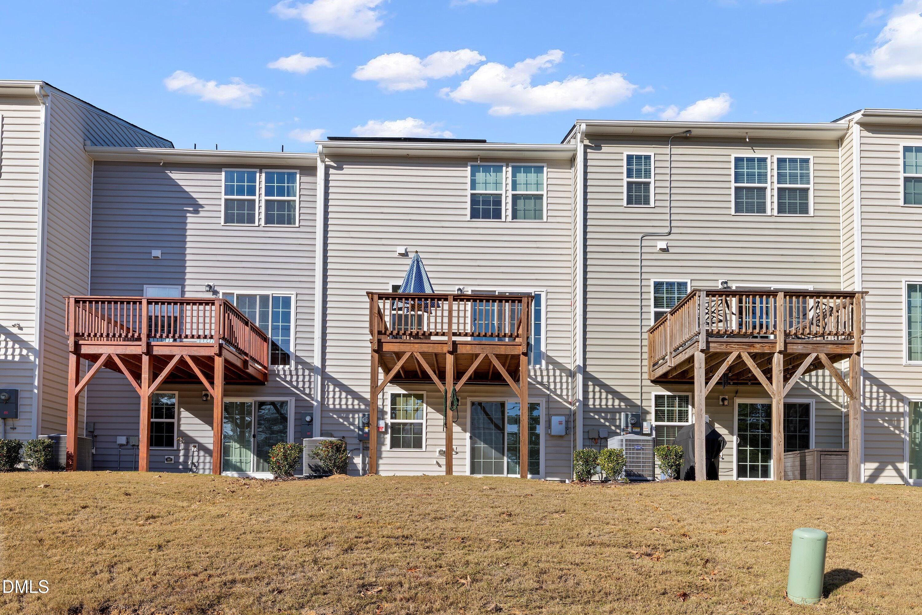 6430 Pathfinder Way Raleigh, NC 27616 - Photo 37 of 39 a view of a house with a yard
