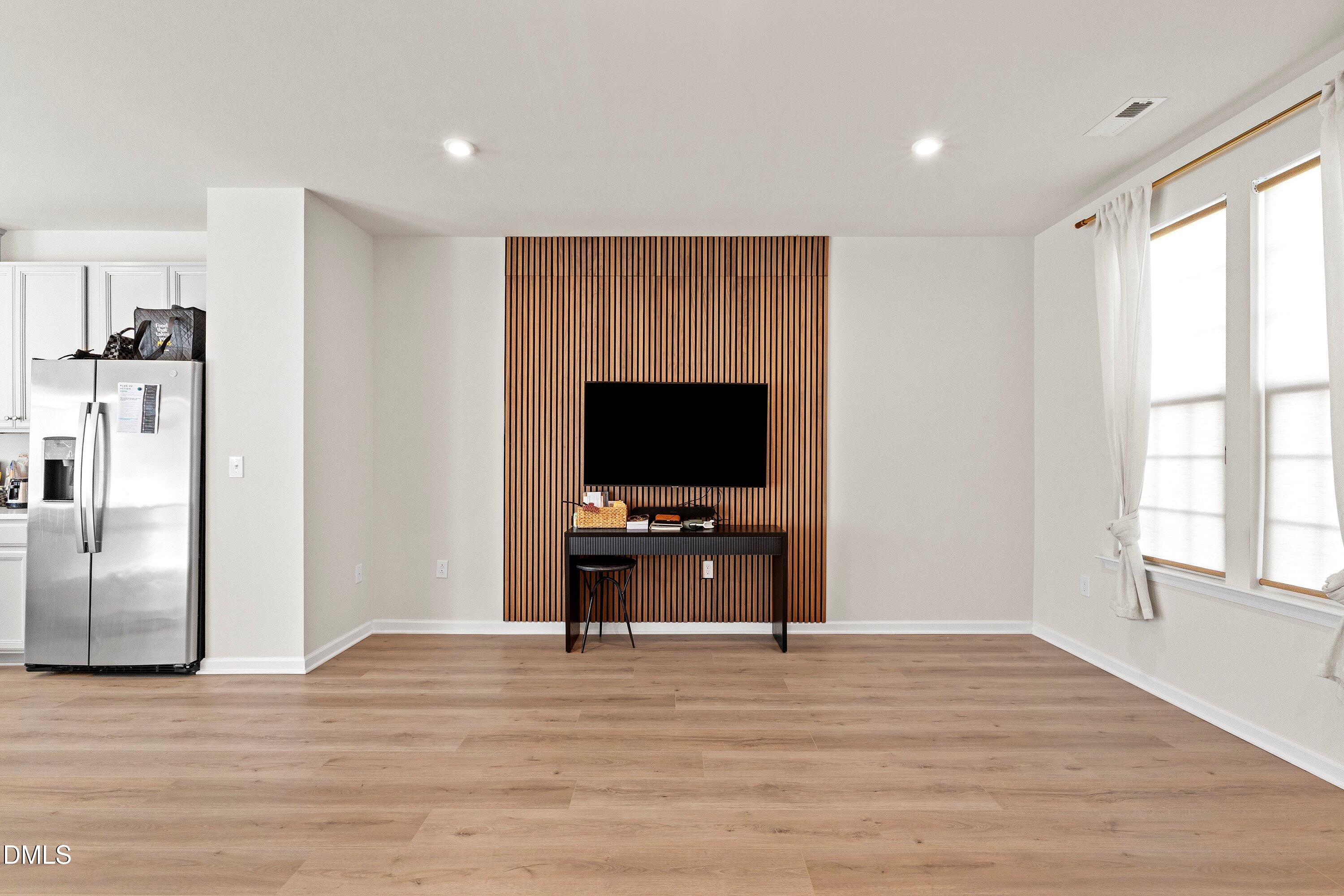 6430 Pathfinder Way Raleigh, NC 27616 - Photo 5 of 39 a view of a livingroom with a kitchen