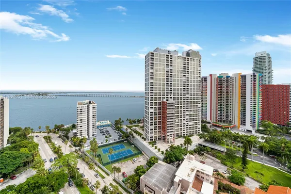 a view of a city with tall buildings