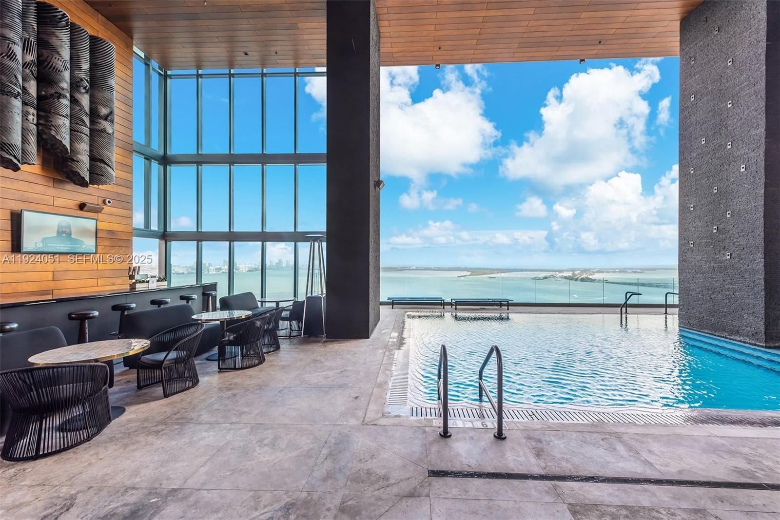 1451 Brickell Avenue, Unit 2003 Miami, FL 33131 - Photo 27 of 36 a living room with furniture