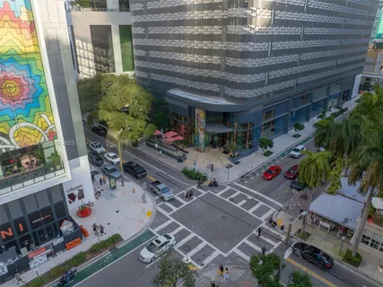 a view of street with sitting area