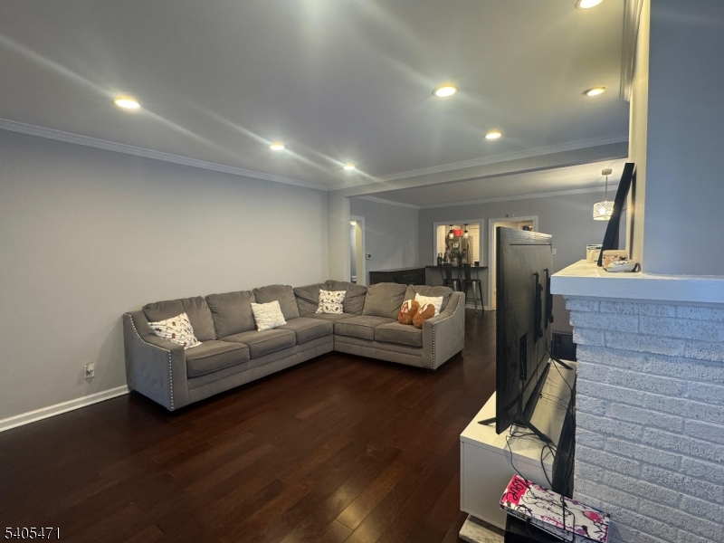 835 Dixie Lane Plainfield, NJ 07062 - Photo 11 of 37 a living room with furniture and a wooden floor