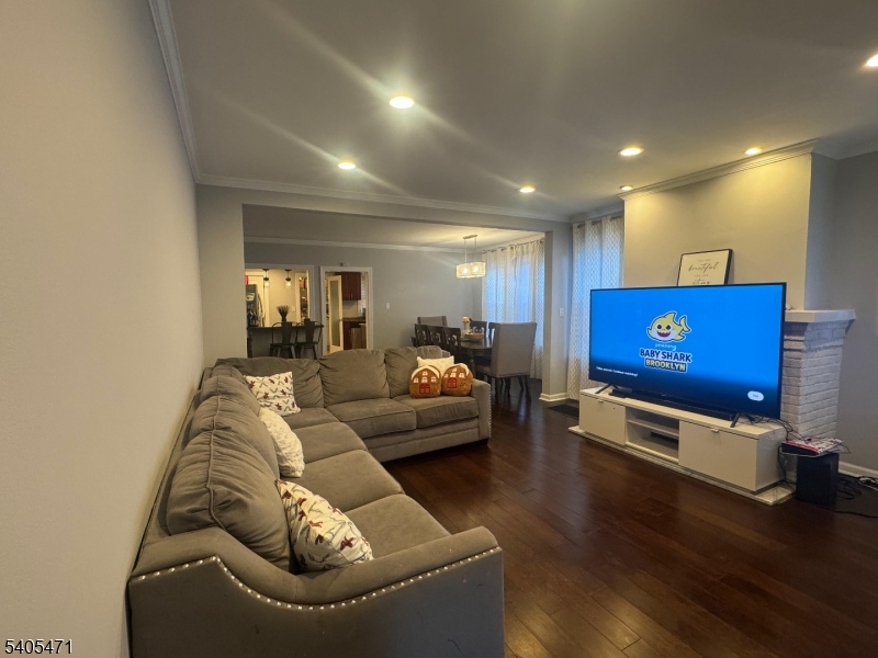835 Dixie Lane Plainfield, NJ 07062 - Photo 14 of 37 a living room with furniture and a couch