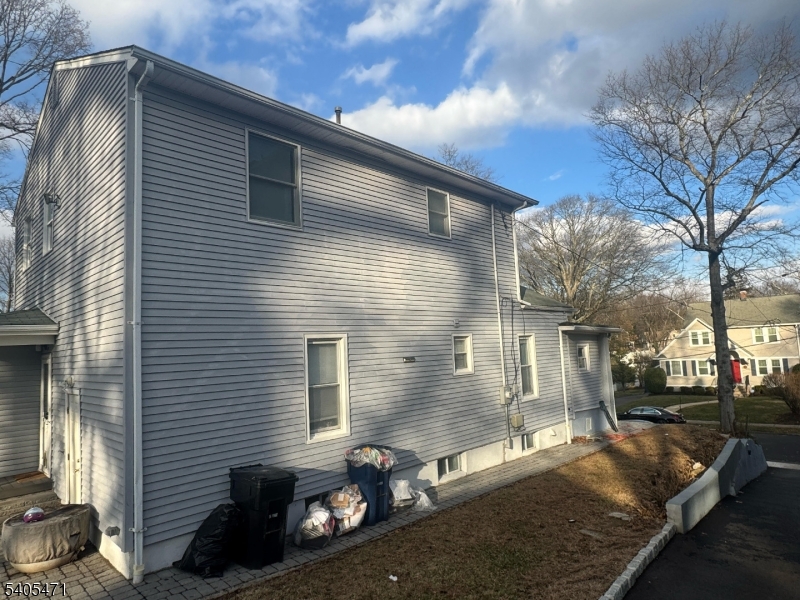835 Dixie Lane Plainfield, NJ 07062 - Photo 2 of 37 a backyard of a house with seating space