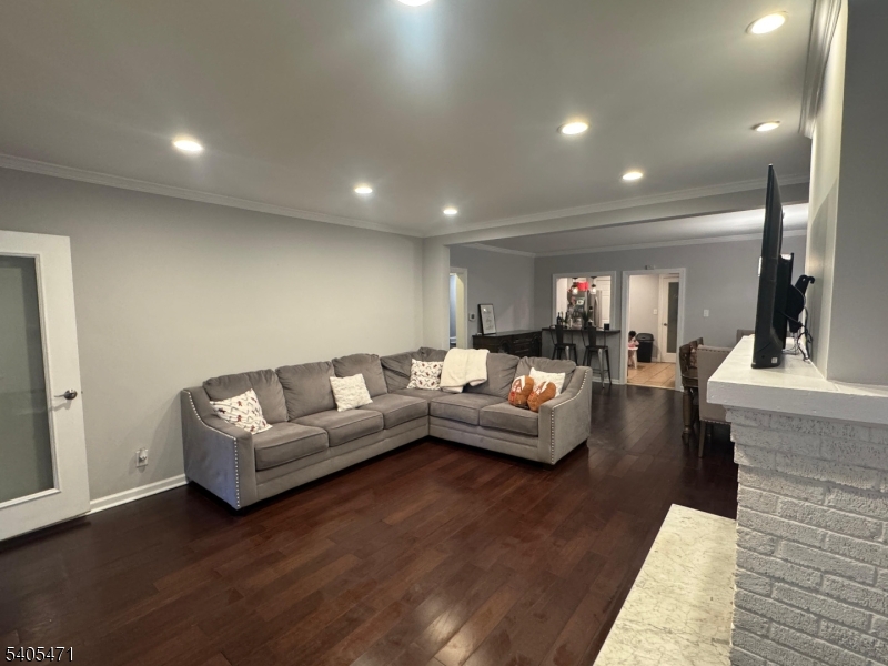 835 Dixie Lane Plainfield, NJ 07062 - Photo 37 of 37 a living room with furniture and wooden floor