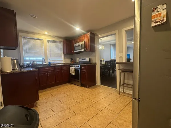 a view of a living room and dining room
