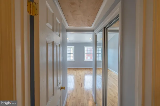 a view of wooden floor in an empty room