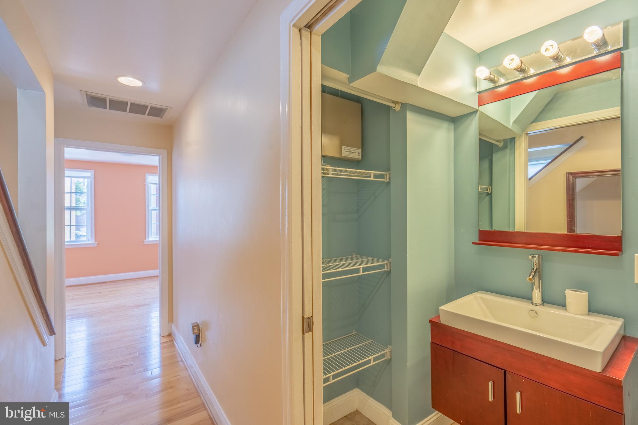 508 Scott Street Baltimore, MD 21230 - Photo 35 of 63 a bathroom with a sink a toilet and shower