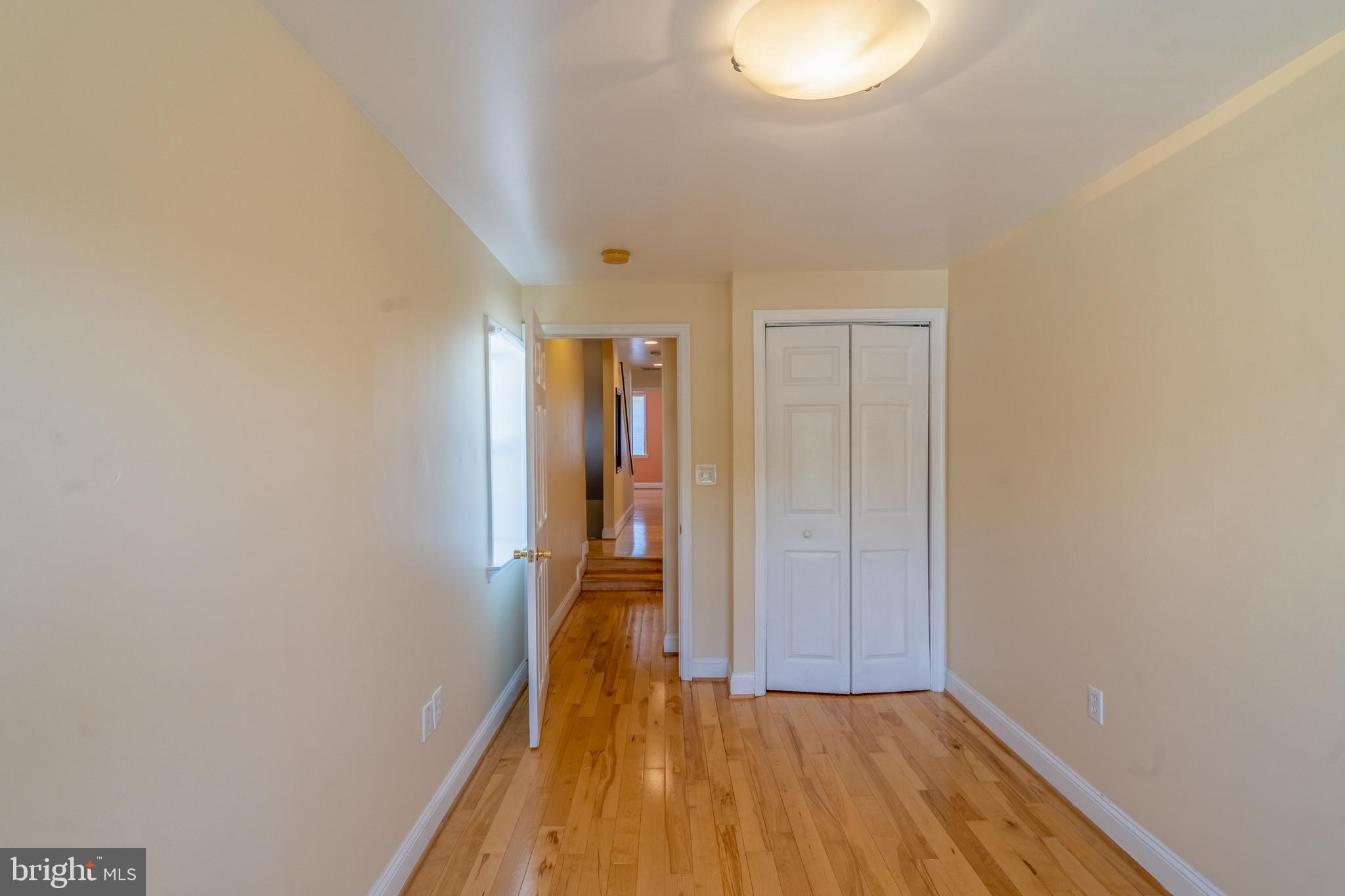 508 Scott Street Baltimore, MD 21230 - Photo 49 of 63 a view of hallway with wooden floor