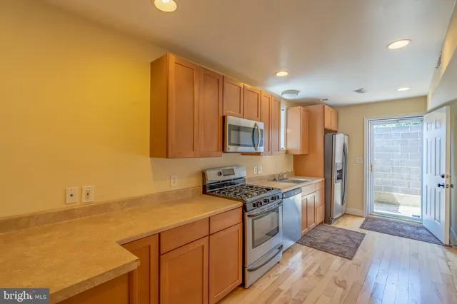 a view of a street with cars