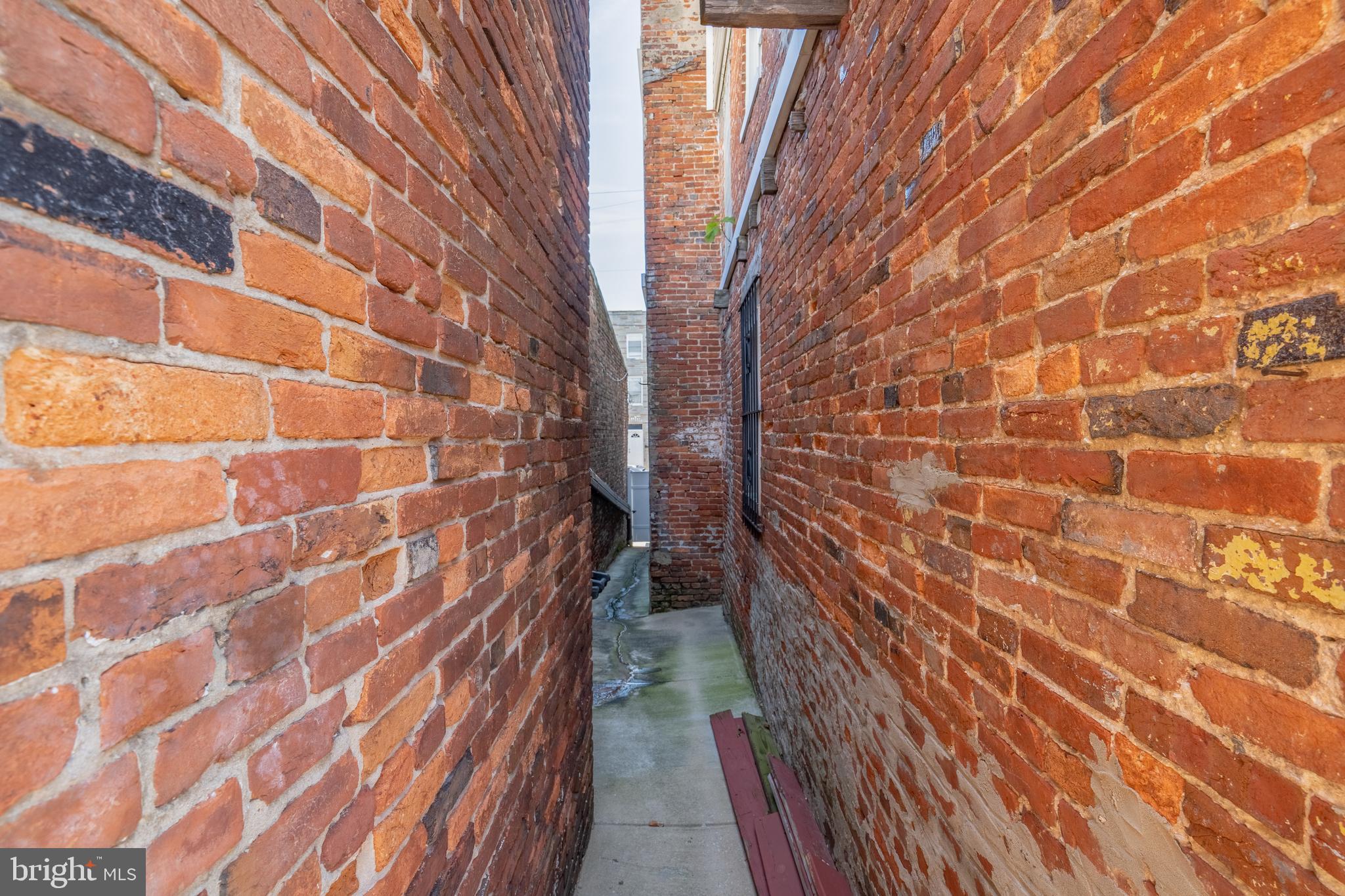 508 Scott Street Baltimore, MD 21230 - Photo 51 of 63 a view of a bathroom with brick walls