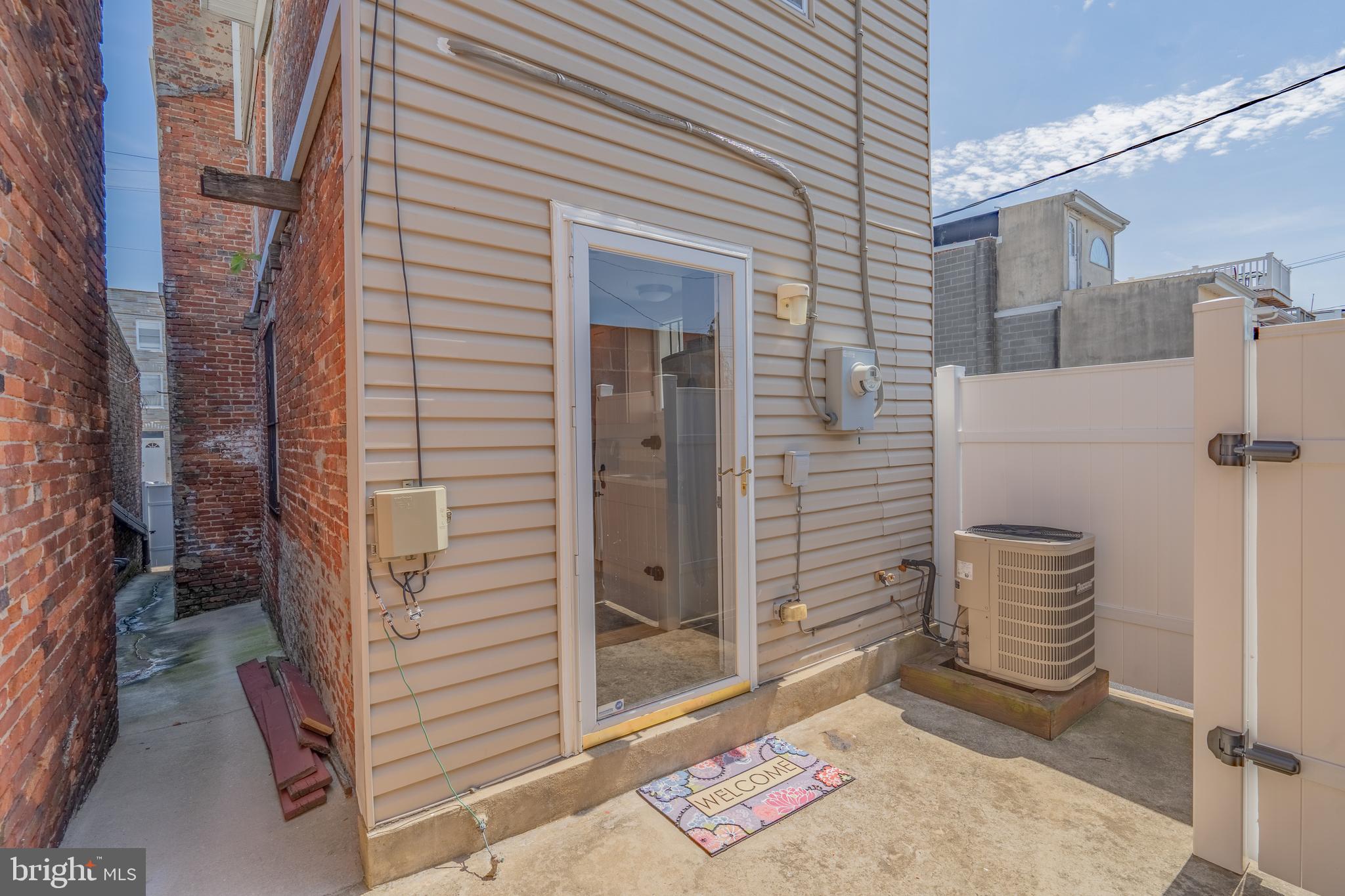 508 Scott Street Baltimore, MD 21230 - Photo 57 of 63 a view of a porch with a door and wooden floor