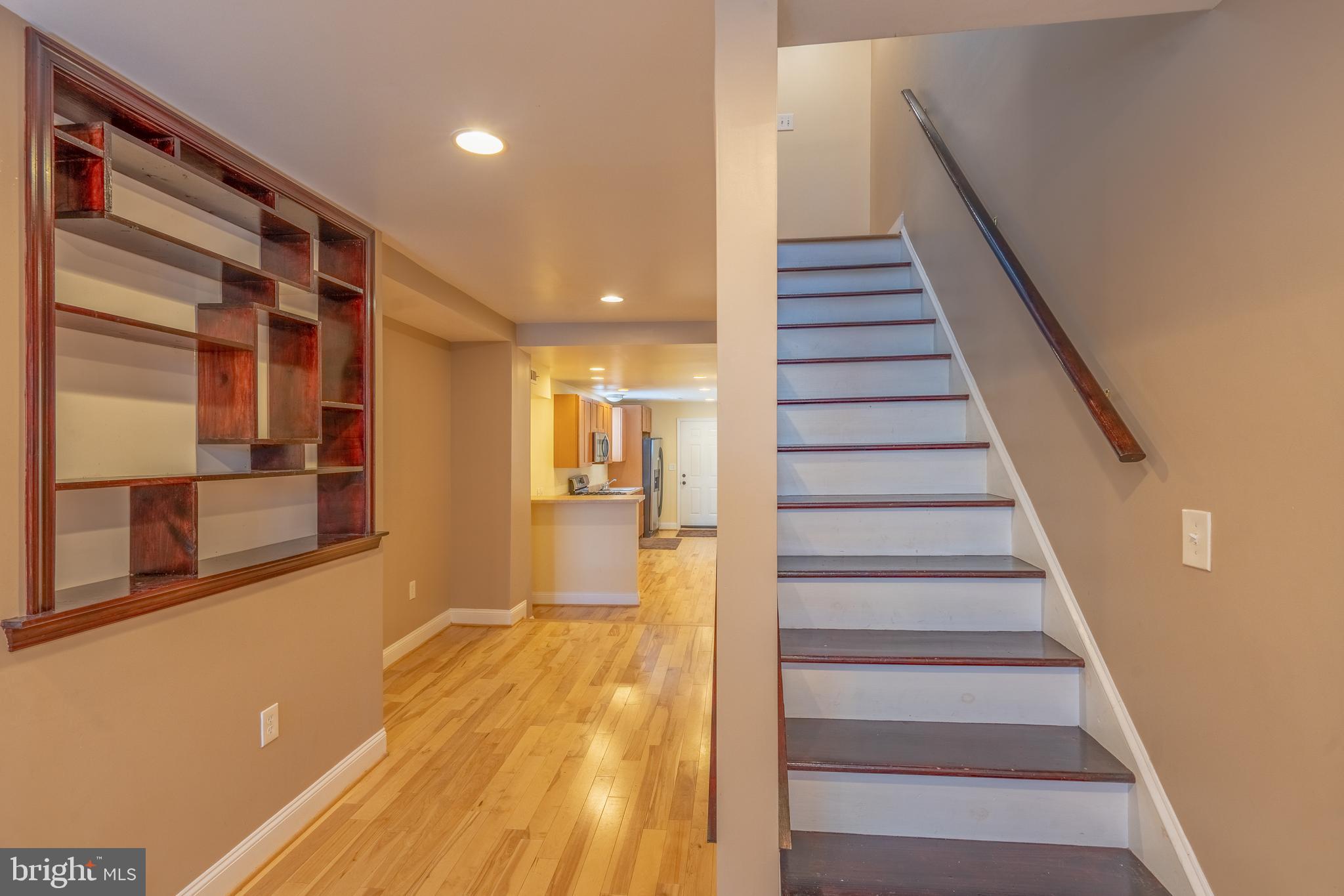 508 Scott Street Baltimore, MD 21230 - Photo 6 of 63 a view of a hallway with wooden floor and entryway