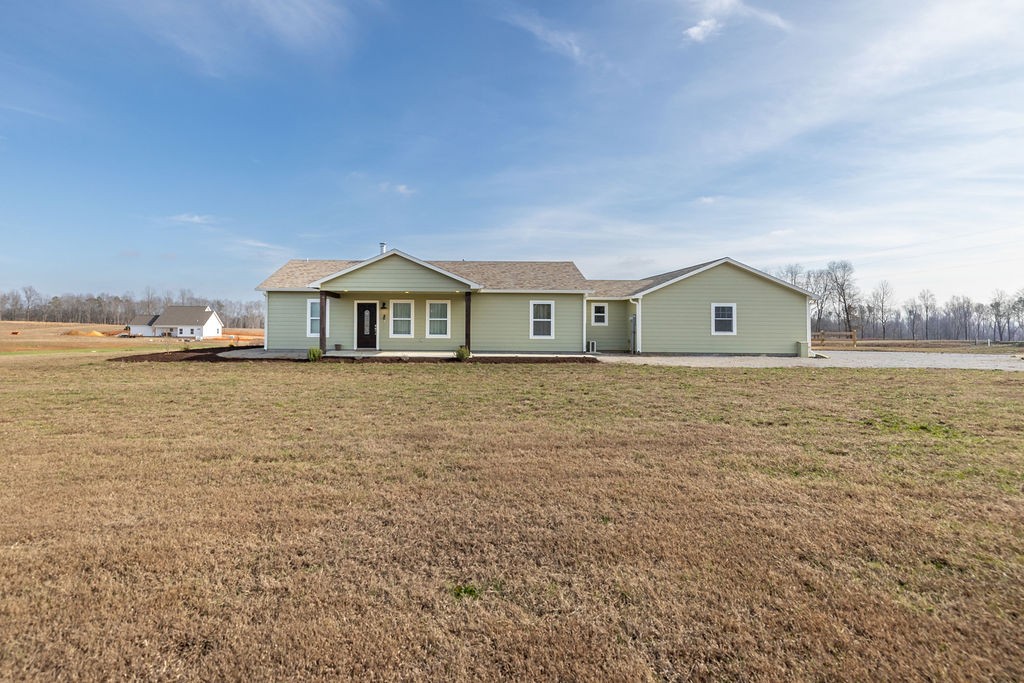 198 Beartown Road Loretto, TN 38469 - Photo 1 of 36 a view of house with an outdoor space and seating area