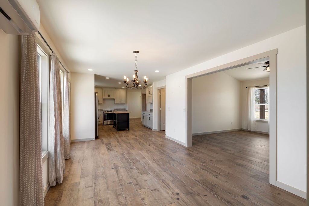 198 Beartown Road Loretto, TN 38469 - Photo 13 of 36 a view of livingroom with furniture and wooden floor