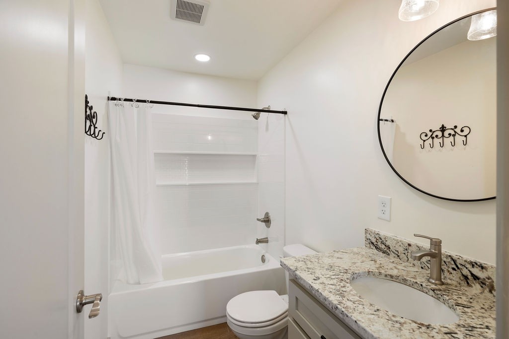198 Beartown Road Loretto, TN 38469 - Photo 20 of 36 a bathroom with a sink toilet and shower