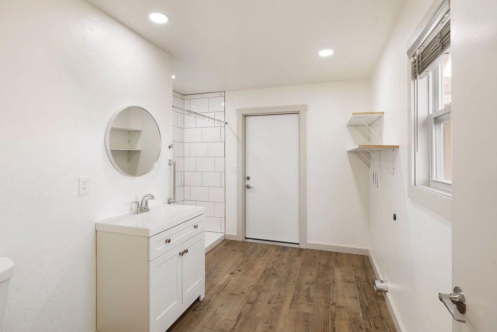 198 Beartown Road Loretto, TN 38469 - Photo 32 of 36 a bathroom with a sink and a mirror