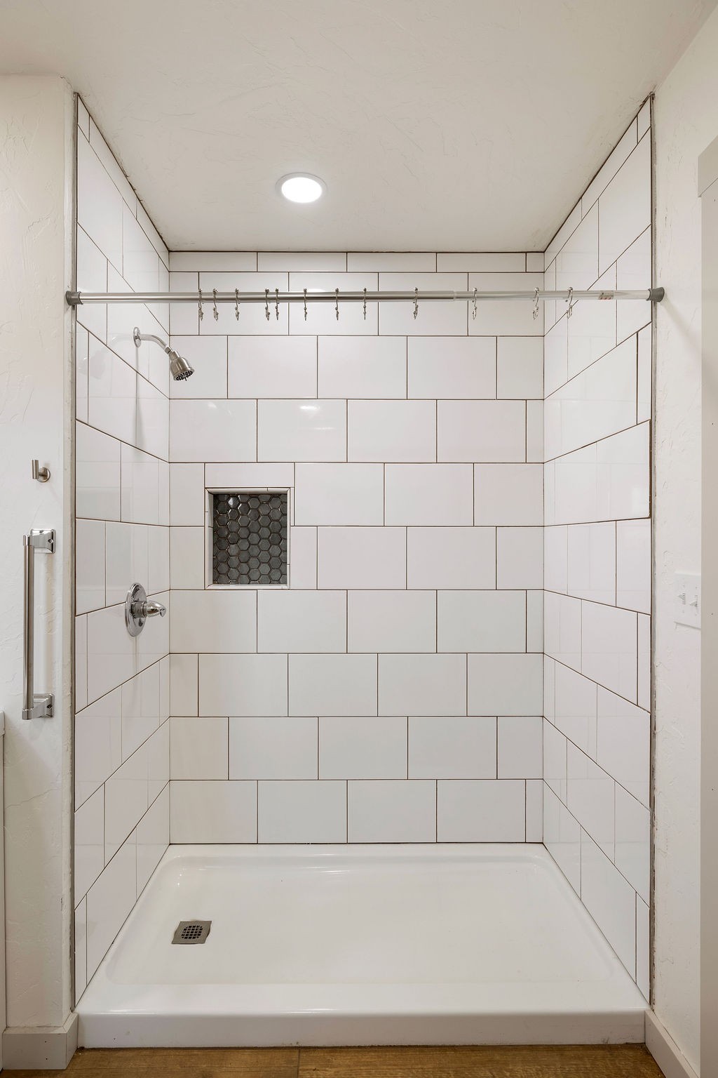 198 Beartown Road Loretto, TN 38469 - Photo 33 of 36 a bathroom with a shower and a bathtub