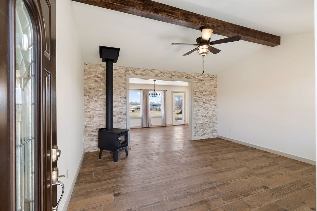 198 Beartown Road Loretto, TN 38469 - Photo 10 of 36 a view of a hallway with wooden floor and a cabinet