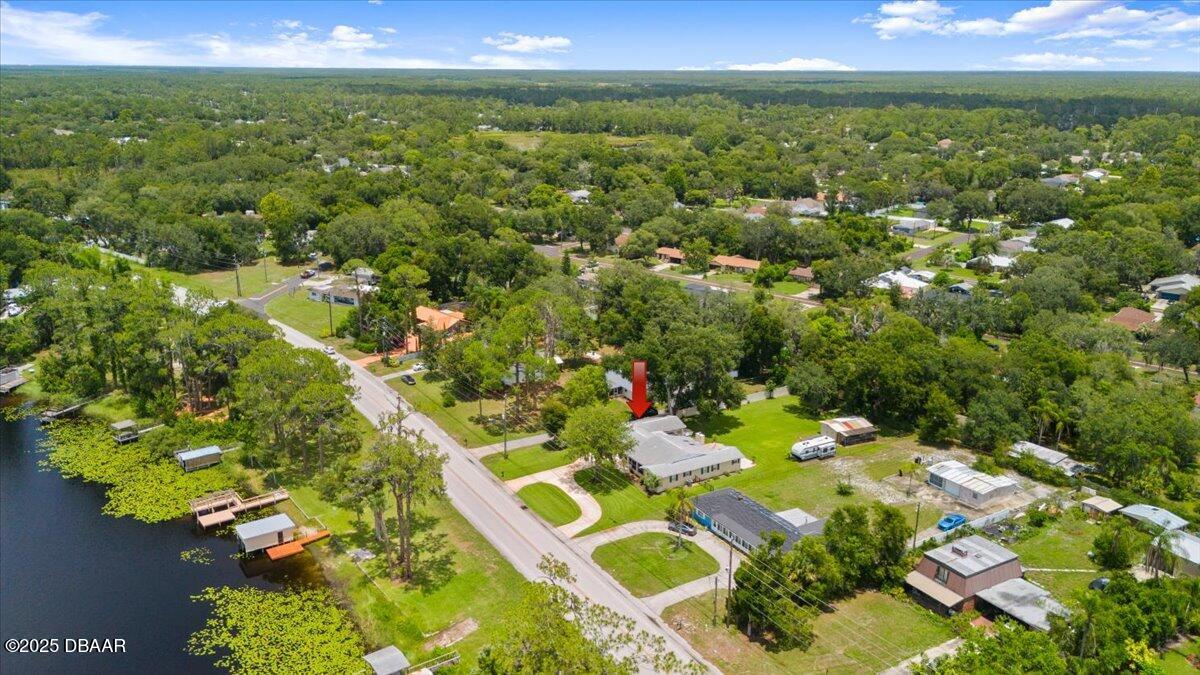 a view of a lake with a yard