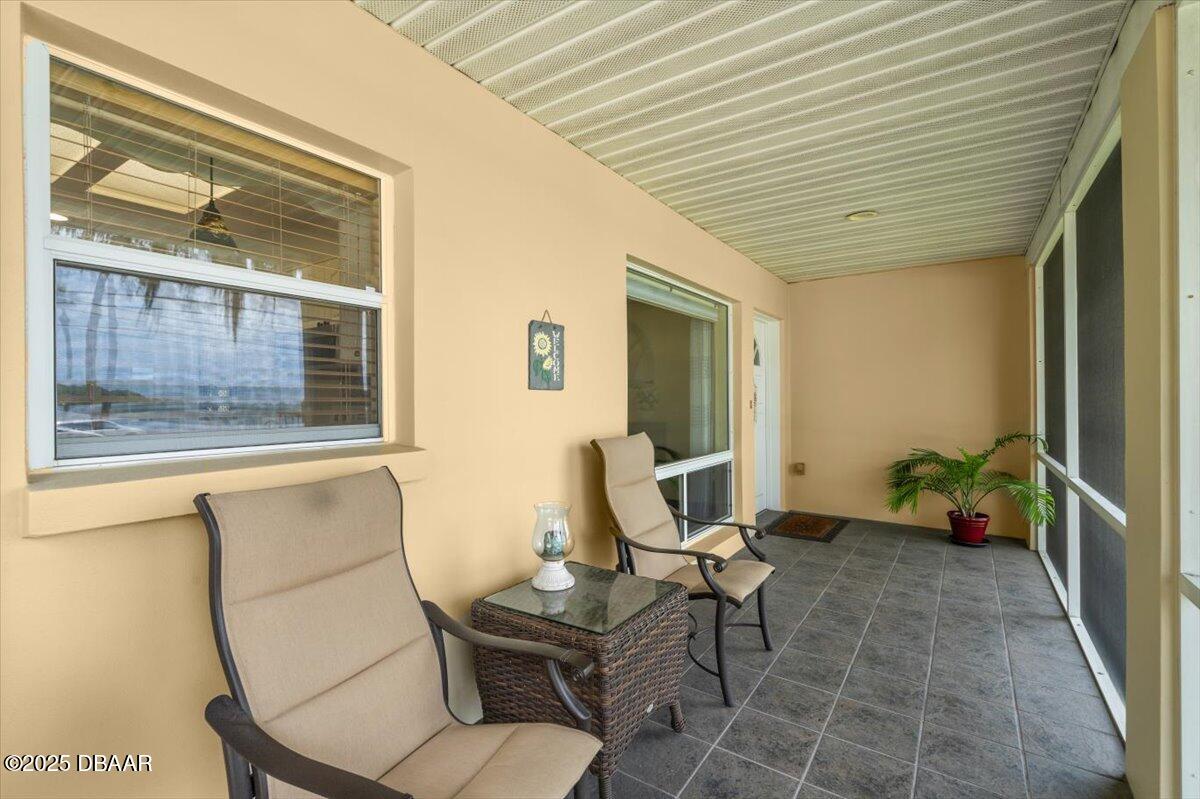 1005 North Kepler Road DeLand, FL 32724 - Photo 14 of 57 a outdoor space with a couch and chairs