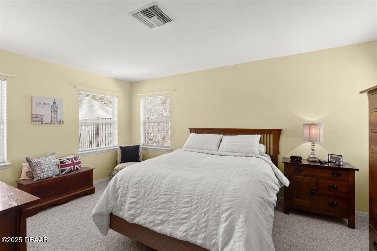 1005 North Kepler Road DeLand, FL 32724 - Photo 42 of 57 a bedroom with a bed and window