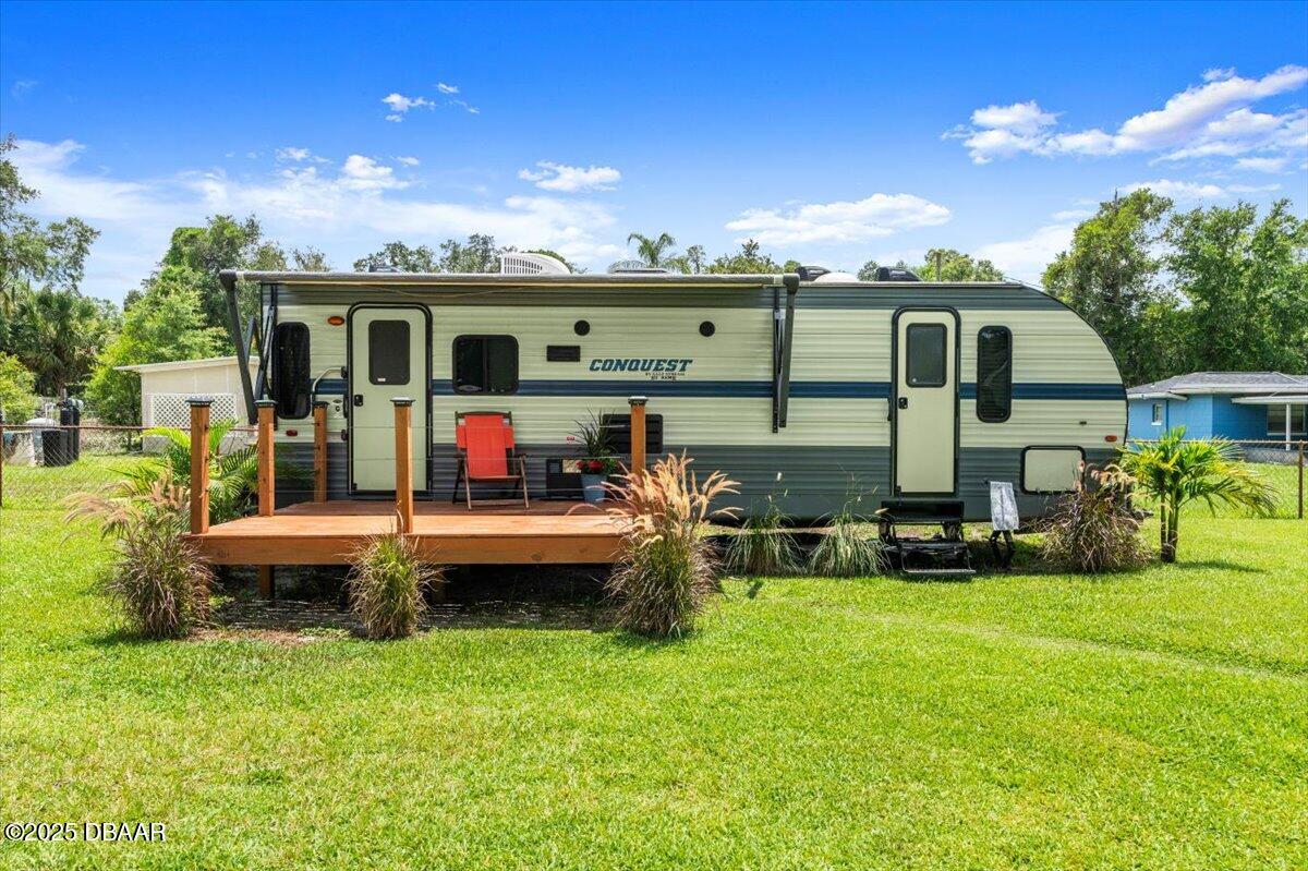 1005 North Kepler Road DeLand, FL 32724 - Photo 50 of 57 a view of a house with a yard balcony and sitting area