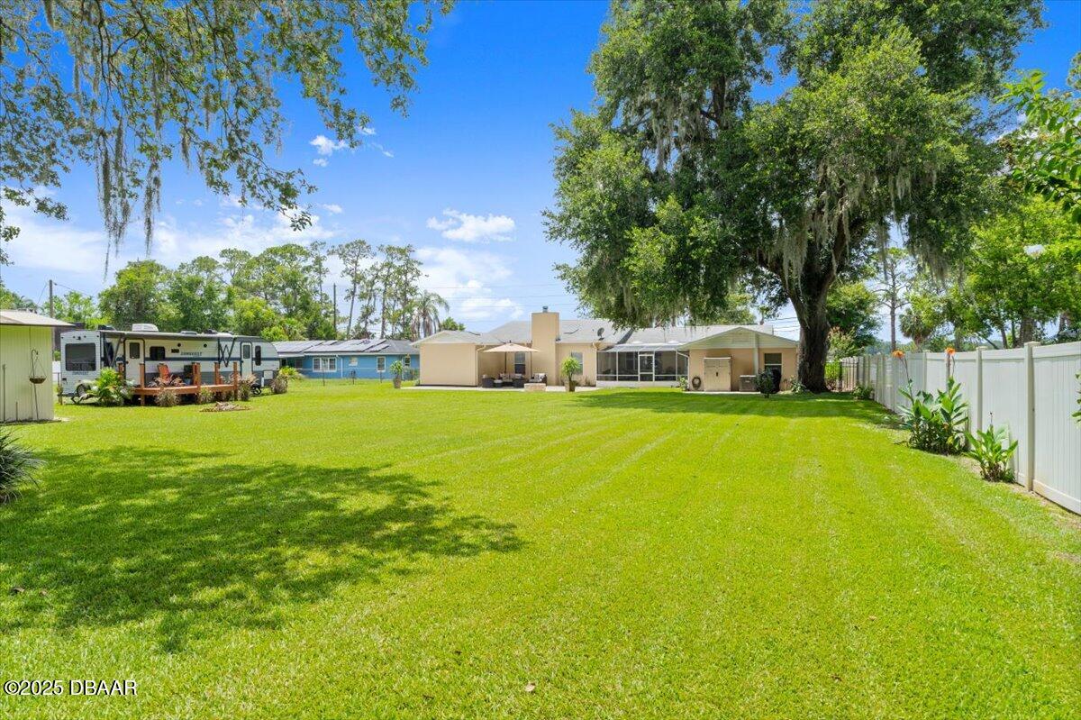 1005 North Kepler Road DeLand, FL 32724 - Photo 53 of 57 a view of a house with a big yard