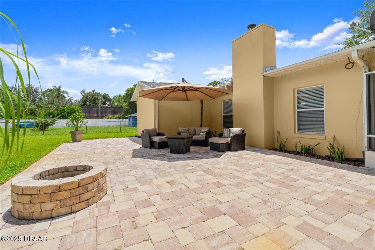 1005 North Kepler Road DeLand, FL 32724 - Photo 54 of 57 a view of a backyard with sitting area