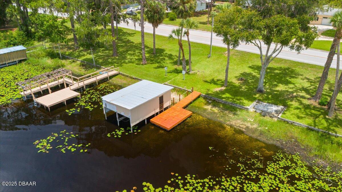 1005 North Kepler Road DeLand, FL 32724 - Photo 6 of 57 a view of a yard with plants