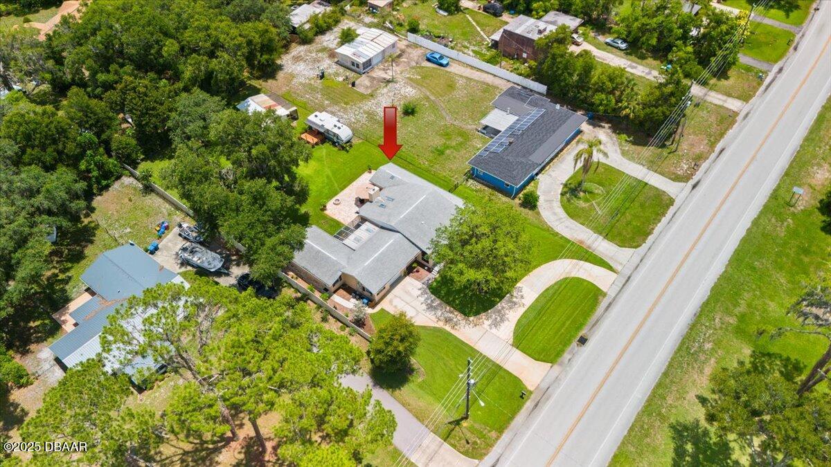 1005 North Kepler Road DeLand, FL 32724 - Photo 7 of 57 an aerial view of residential house with outdoor space and swimming pool