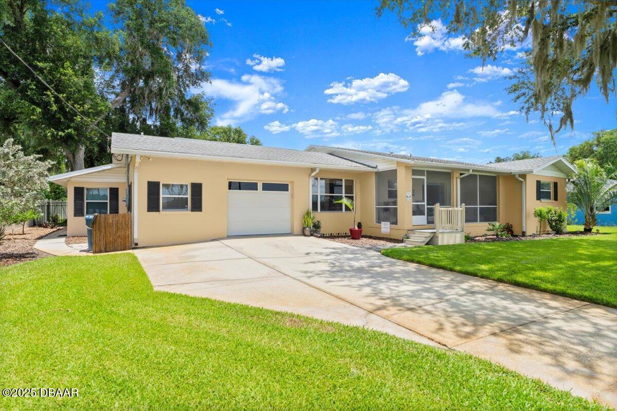1005 North Kepler Road DeLand, FL 32724 - Photo 10 of 57 a view of a yard in front of house