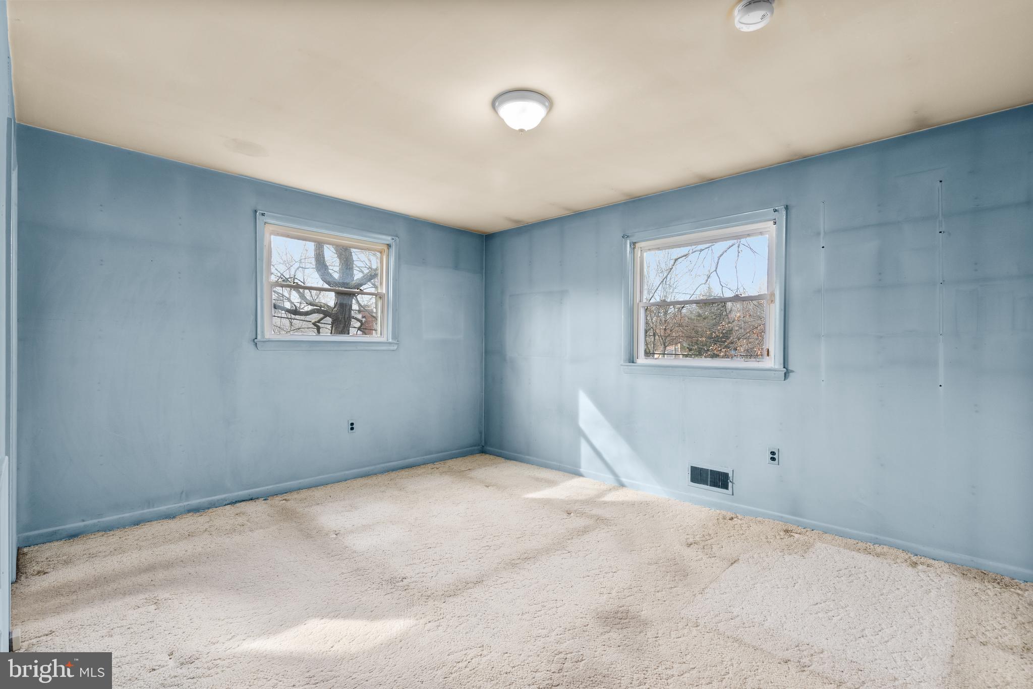 11411 Indigo Drive Beltsville, MD 20705 - Photo 23 of 40 a view of an empty room with a window