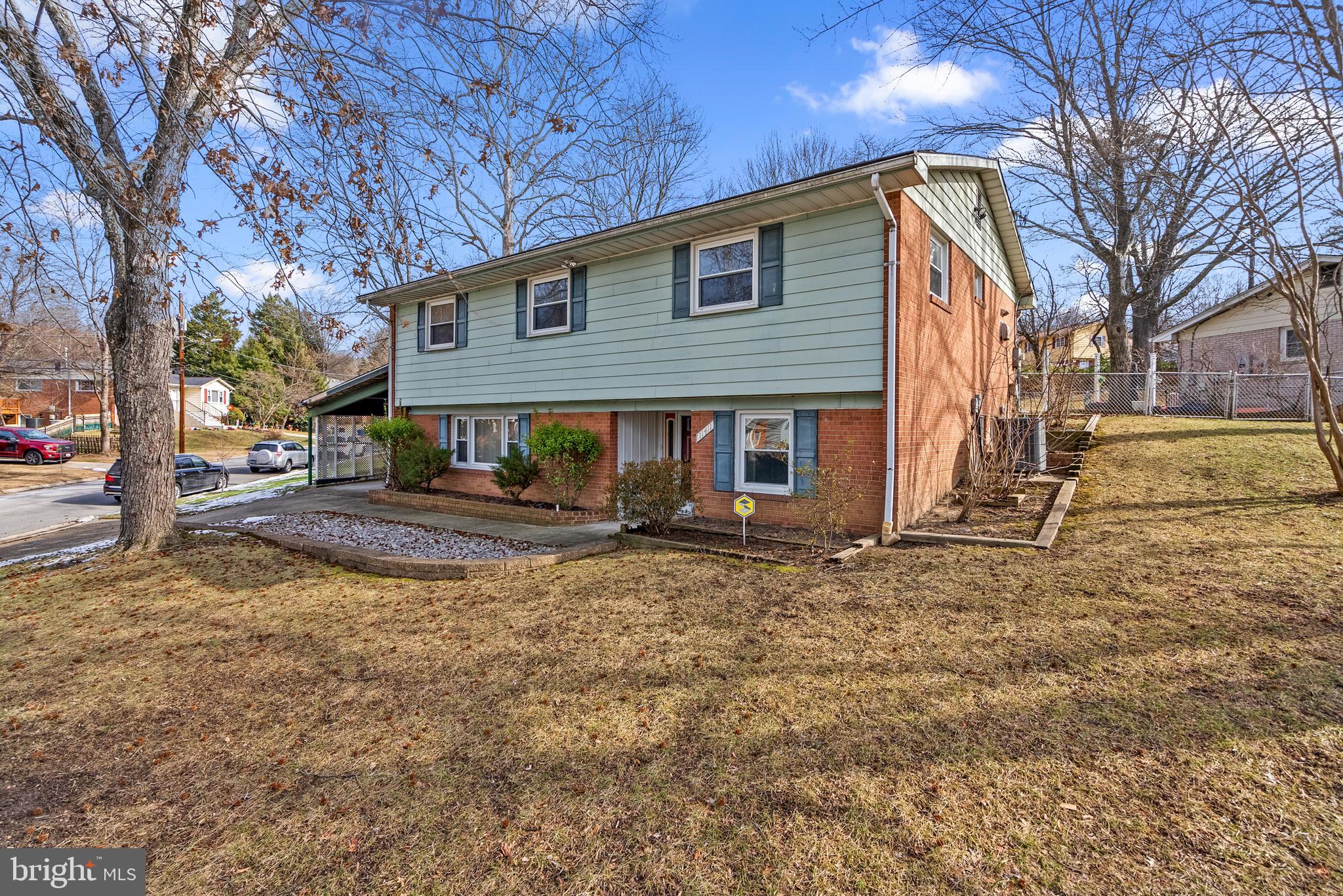 11411 Indigo Drive Beltsville, MD 20705 - Photo 4 of 40 a view of a house with a yard