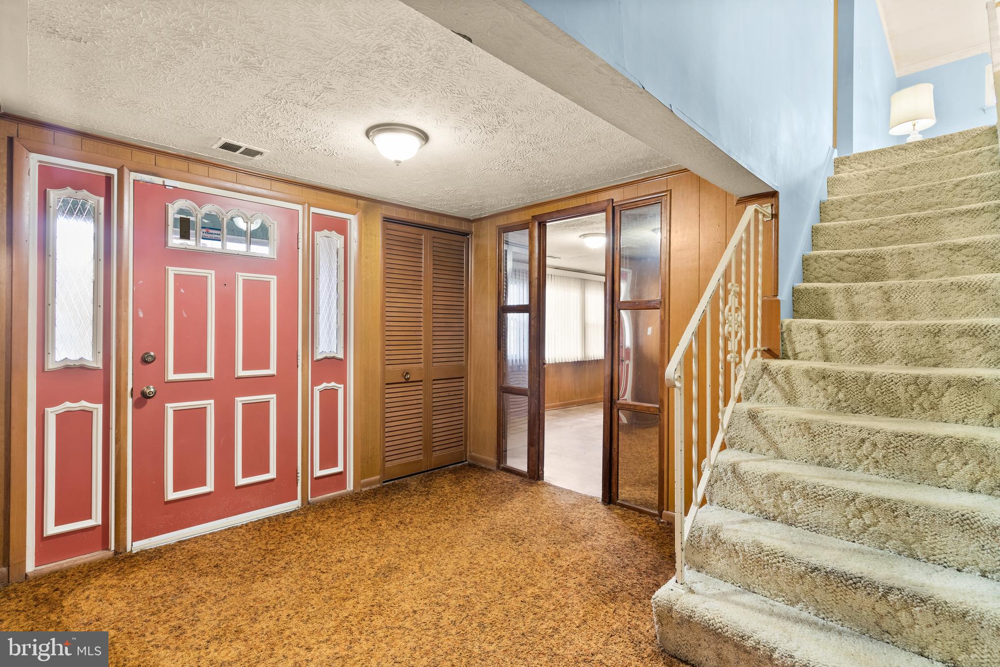 11411 Indigo Drive Beltsville, MD 20705 - Photo 6 of 40 a view of an entryway with staircase