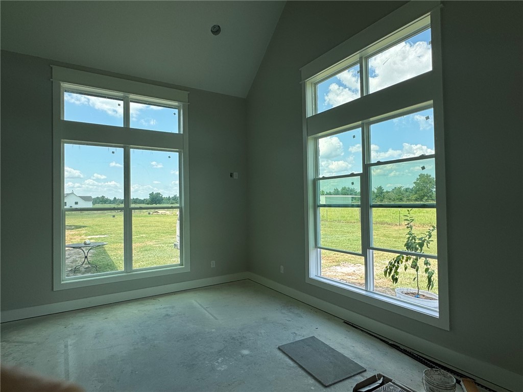 13504 Hudson Farms Road Hearne, TX 77859 - Photo 14 of 32 a view of an empty room with a window