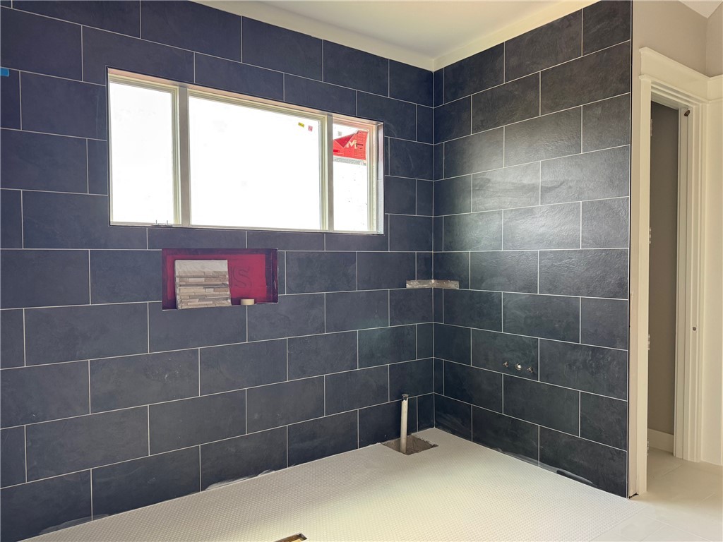 13504 Hudson Farms Road Hearne, TX 77859 - Photo 16 of 32 a bathroom with a shower