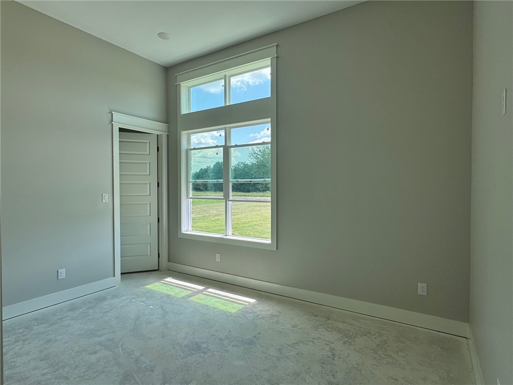 13504 Hudson Farms Road Hearne, TX 77859 - Photo 17 of 32 an empty room with a window