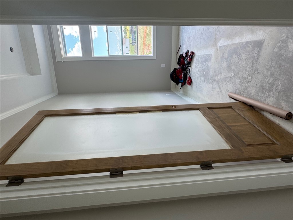 13504 Hudson Farms Road Hearne, TX 77859 - Photo 22 of 32 Entryway with ornamental molding and a raised ceil