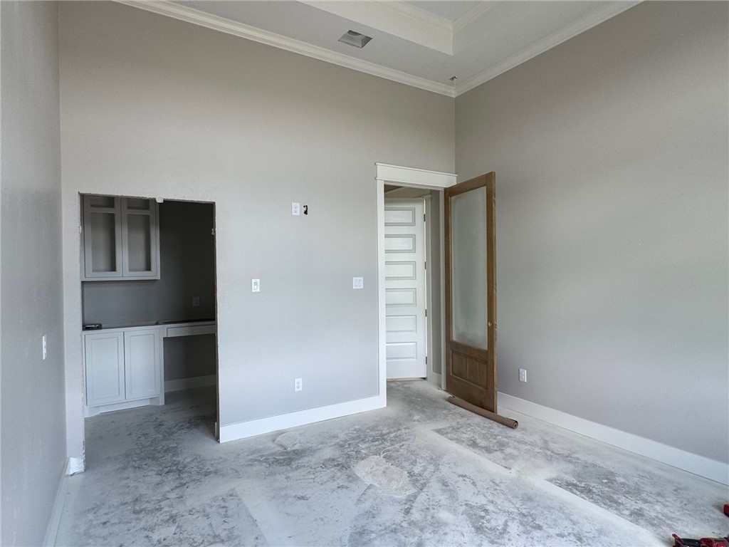 13504 Hudson Farms Road Hearne, TX 77859 - Photo 23 of 32 an empty room with closet and windows